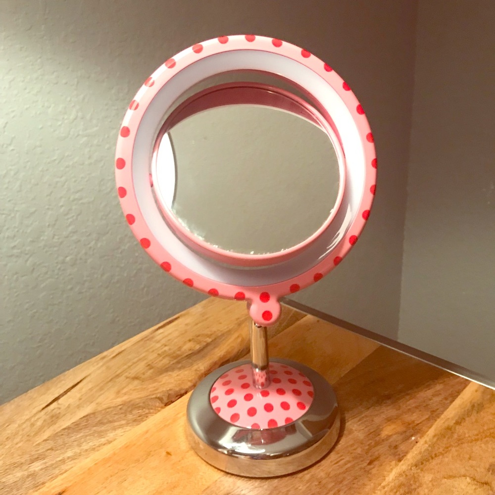 Lighted, Enlarging Vanity Mirror